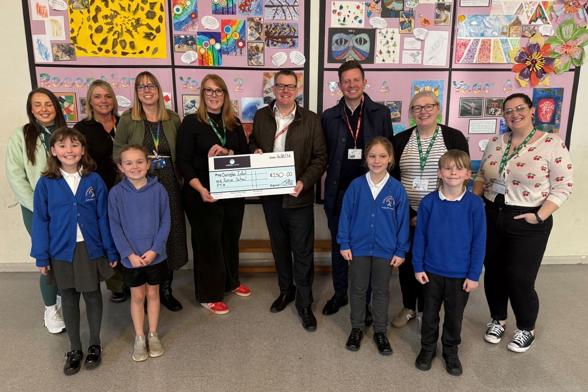Presenting the children and PTA at Durrington Infant & Junior School with a cheque